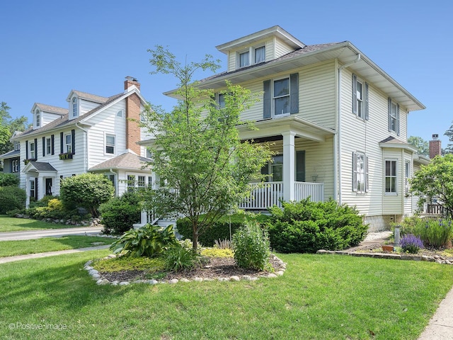217 S Craig Pl, Lombard, IL 60148 - traditional style home with a front lawn and a porch