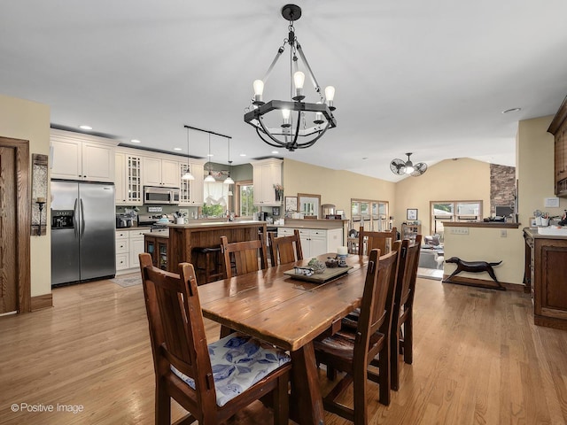 217 S Craig Pl, Lombard, IL 60148 - dining room featuring a chandelier, light wood finished floors, lofted ceiling, recessed lighting, and baseboards
