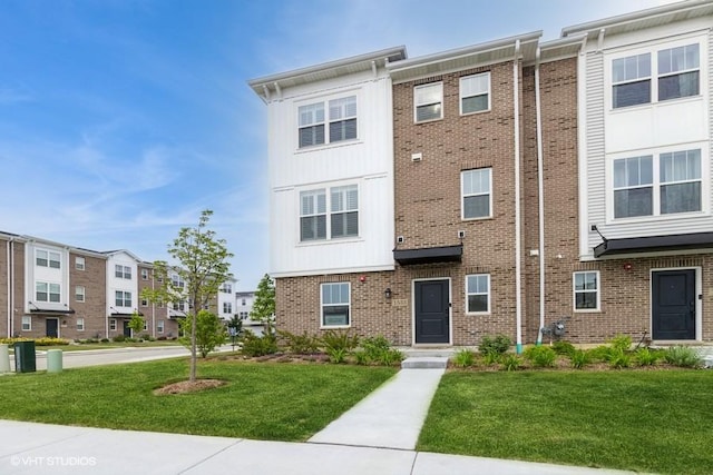 1533 Executive Way, Des Plaines, IL 60018 - multi unit property with a front lawn, brick siding, and a residential view