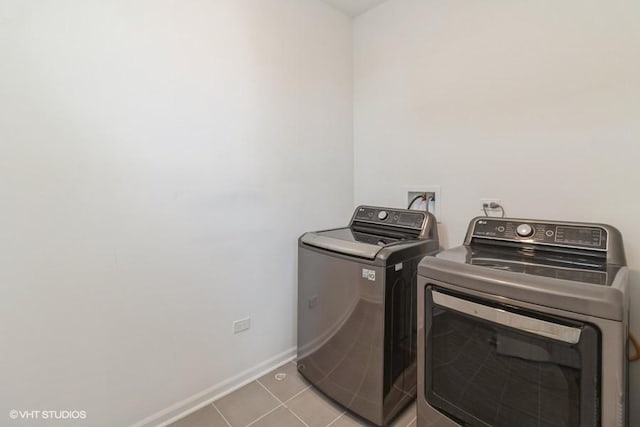 1533 Executive Way, Des Plaines, IL 60018 - laundry area with independent washer and dryer and light tile patterned flooring
