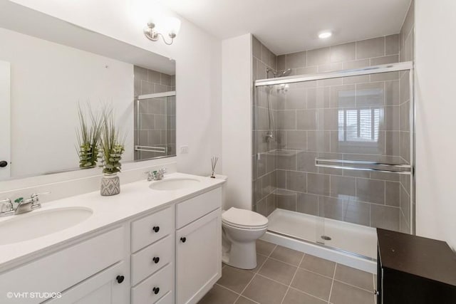 1533 Executive Way, Des Plaines, IL 60018 - full bathroom with double vanity, tile patterned floors, and a stall shower