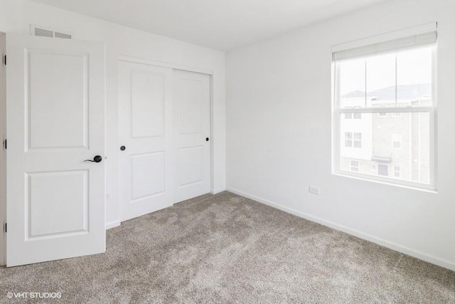 1533 Executive Way, Des Plaines, IL 60018 - unfurnished bedroom featuring carpet and a closet