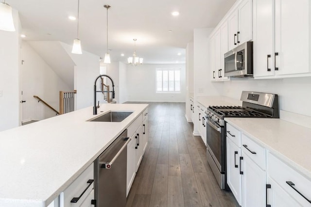 1533 Executive Way, Des Plaines, IL 60018 - kitchen featuring appliances with stainless steel finishes, hardwood / wood-style flooring, recessed lighting, light countertops, and white cabinets