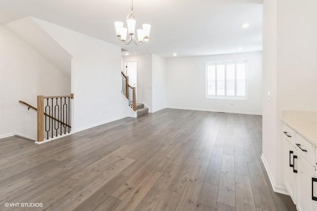 1533 Executive Way, Des Plaines, IL 60018 - unfurnished living room featuring a chandelier, hardwood / wood-style flooring, and recessed lighting