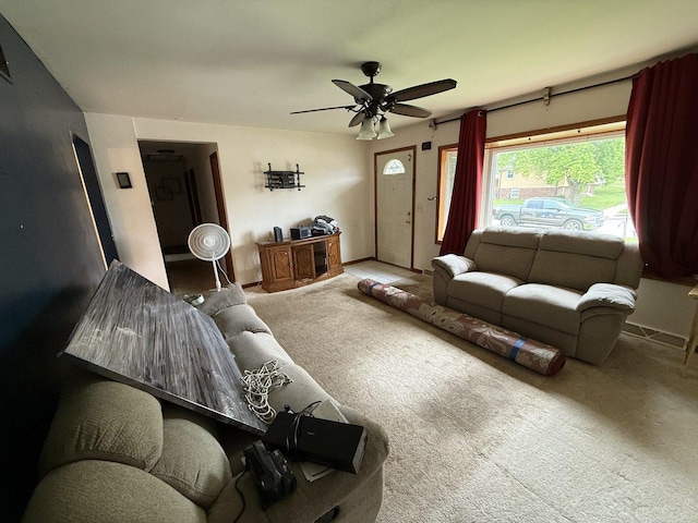 3357 D Hutchison Ave, Joliet, IL 60431 - carpeted living area featuring a ceiling fan and baseboards