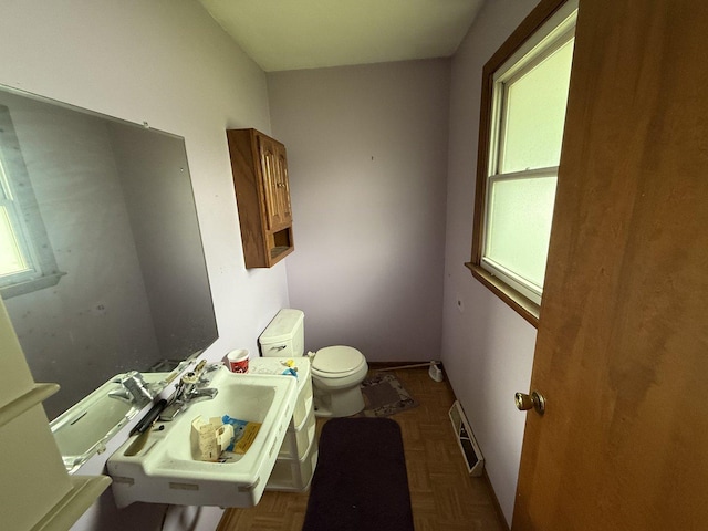 3357 D Hutchison Ave, Joliet, IL 60431 - half bath with toilet, healthy amount of natural light, and a sink