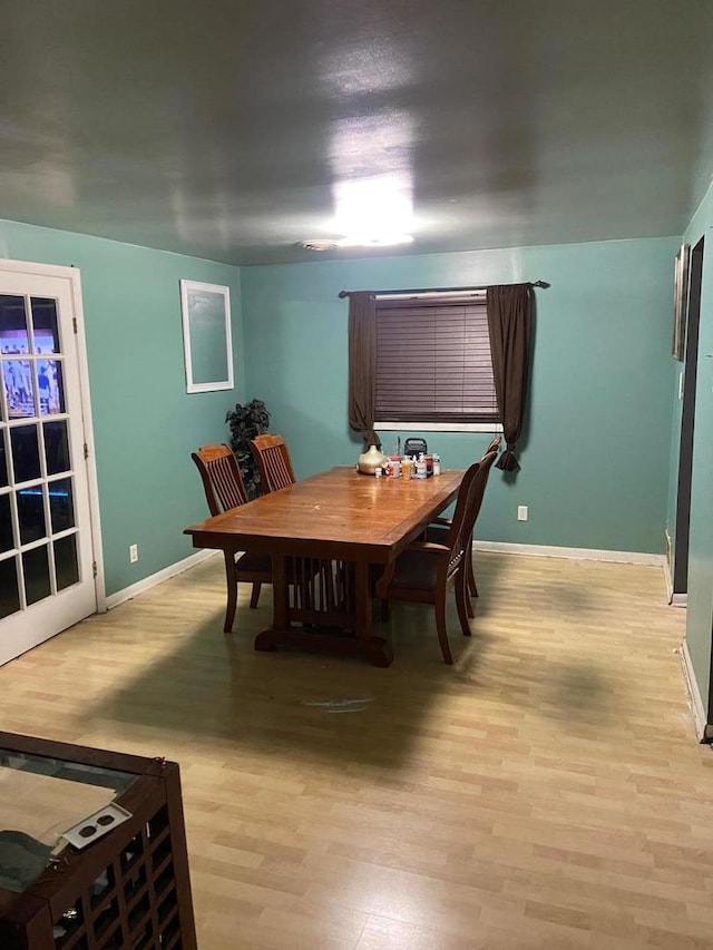 18020 Ridgeland Ave, Lansing, IL 60438 - dining room with wood finished floors and baseboards