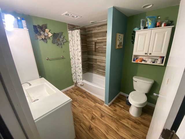 18020 Ridgeland Ave, Lansing, IL 60438 - full bathroom featuring toilet, wood finished floors, vanity, and baseboards