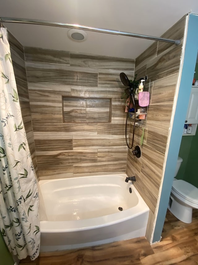 18020 Ridgeland Ave, Lansing, IL 60438 - bathroom with shower / bath combo with shower curtain, toilet, and wood finished floors