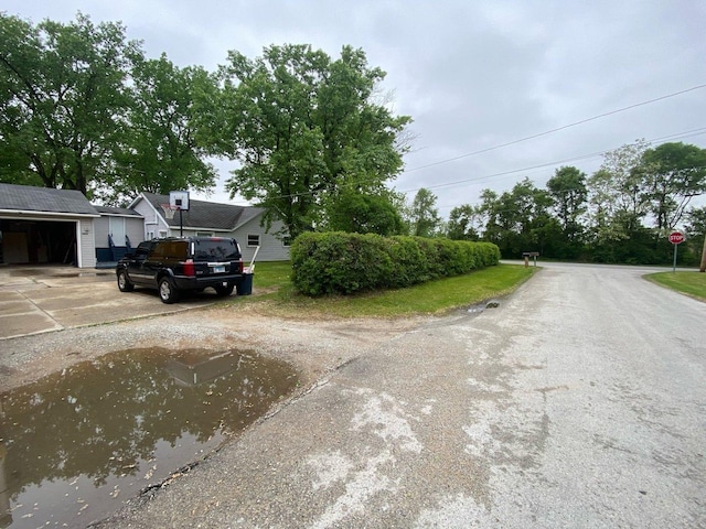 18020 Ridgeland Ave, Lansing, IL 60438 - view of asphalt street with traffic signs