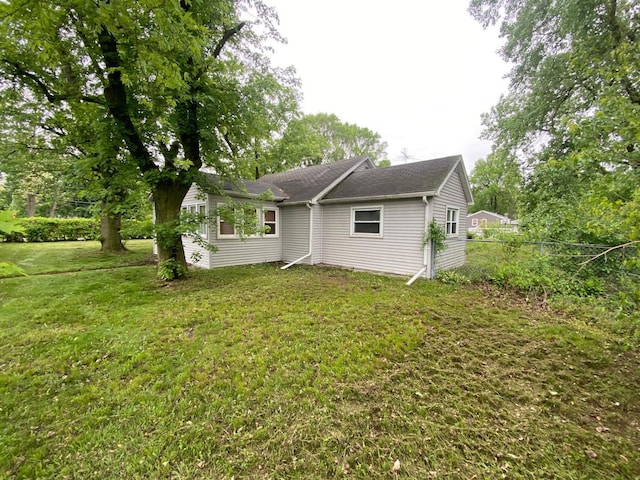 18020 Ridgeland Ave, Lansing, IL 60438 - back of house featuring a shingled roof