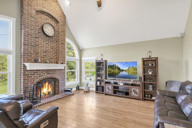 7N310 Ridge Line Rd, Saint Charles, IL 60175 - living room with a brick fireplace, high vaulted ceiling, wood finished floors, and ceiling fan