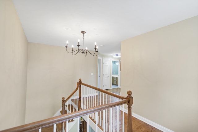 7N310 Ridge Line Rd, Saint Charles, IL 60175 - corridor with an upstairs landing, a chandelier, wood finished floors, and baseboards