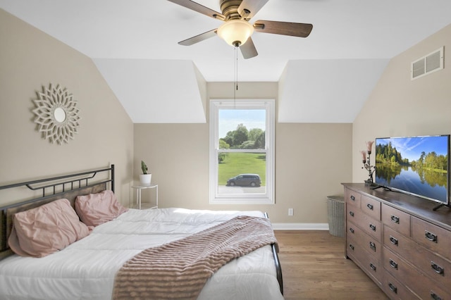 7N310 Ridge Line Rd, Saint Charles, IL 60175 - bedroom with wood finished floors, baseboards, vaulted ceiling, and a ceiling fan