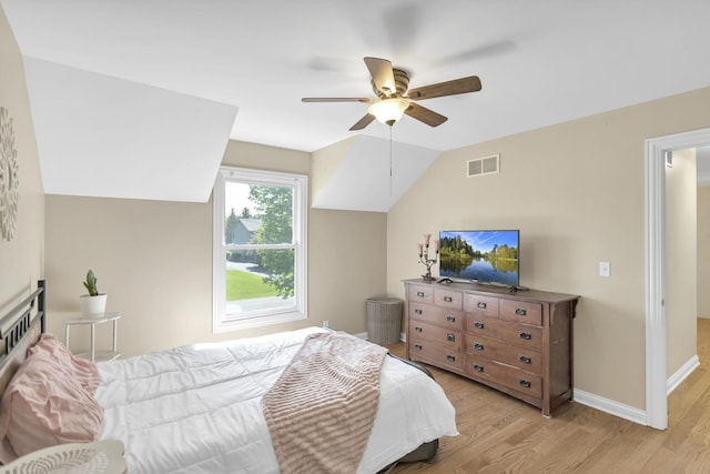 7N310 Ridge Line Rd, Saint Charles, IL 60175 - bedroom featuring light wood-style floors, vaulted ceiling, a ceiling fan, and baseboards