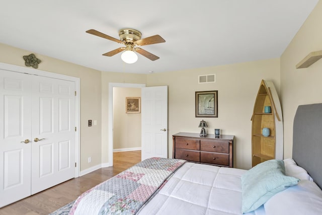 7N310 Ridge Line Rd, Saint Charles, IL 60175 - bedroom featuring wood finished floors, a ceiling fan, baseboards, and a closet