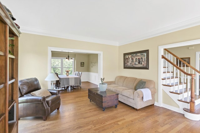 7N310 Ridge Line Rd, Saint Charles, IL 60175 - living area with ornamental molding, wood finished floors, stairs, a chandelier, and wainscoting