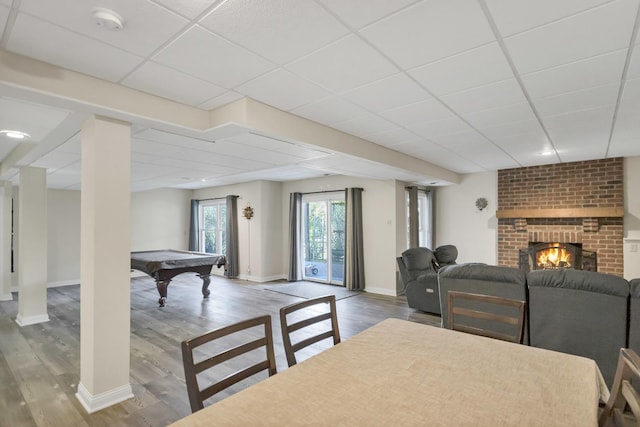 7N310 Ridge Line Rd, Saint Charles, IL 60175 - dining room featuring billiards, wood finished floors, a paneled ceiling, a fireplace, and baseboards