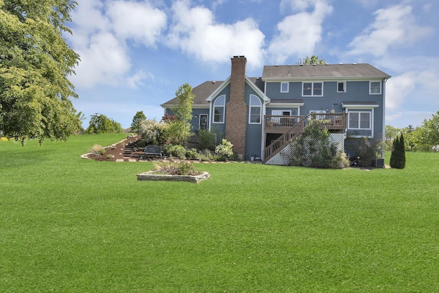 7N310 Ridge Line Rd, Saint Charles, IL 60175 - rear view of property featuring stairway, a chimney, a wooden deck, and a lawn
