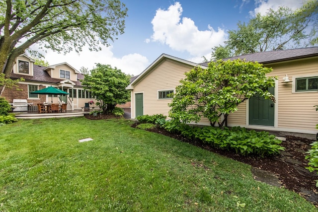 740 Wisner St, Park Ridge, IL 60068 - view of green lawn with a patio