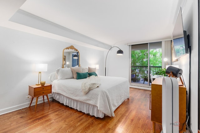 201 E Chestnut St Unit 3C, Chicago, IL 60611 - bedroom featuring light wood-type flooring and baseboards