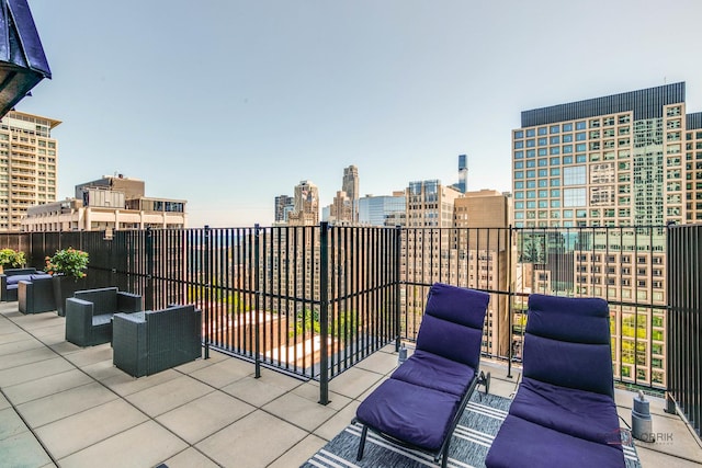 201 E Chestnut St Unit 3C, Chicago, IL 60611 - view of patio / terrace with a balcony and a city view
