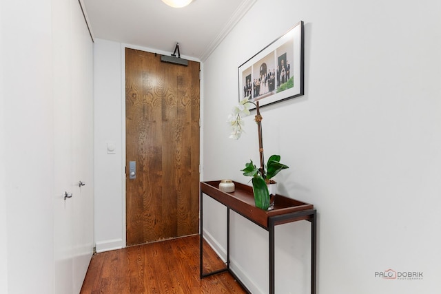 201 E Chestnut St Unit 3C, Chicago, IL 60611 - doorway to outside featuring ornamental molding and wood finished floors