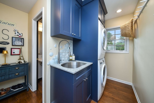 5234 Cedar Ct, Lisle, IL 60532 - laundry room with stacked washing machine and dryer, dark wood-style floors, cabinet space, and baseboards