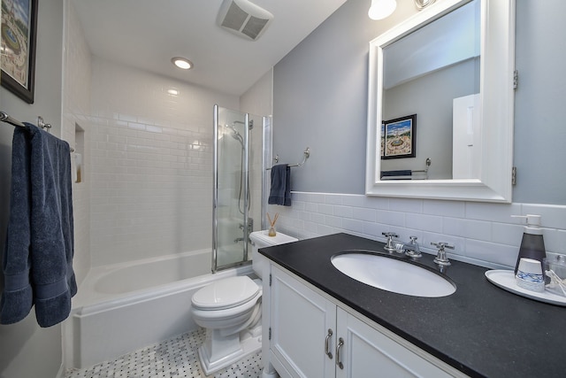 5234 Cedar Ct, Lisle, IL 60532 - full bath with vanity, toilet, tile walls, washtub / shower combination, and recessed lighting