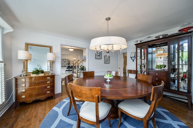 5234 Cedar Ct, Lisle, IL 60532 - dining area with a chandelier, crown molding, wood finished floors, and stairs