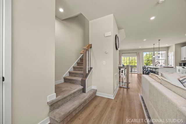 165 Canterbury Way, Lake Zurich, IL 60047 - stairway with wood finished floors and recessed lighting