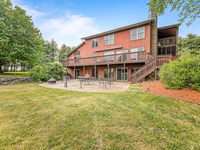 9104 E Weber Rd, Ridott, IL 61067 - rear view of house featuring a lawn, a chimney, a wooden deck, a patio area, and stairway