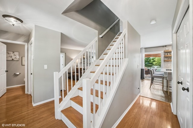1250 Fernleaf Dr, Crystal Lake, IL 60014 - stairs featuring wood finished floors and baseboards