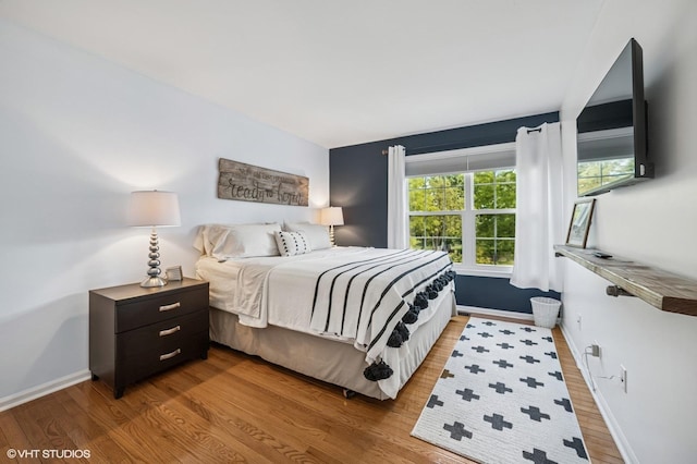 1250 Fernleaf Dr, Crystal Lake, IL 60014 - bedroom featuring wood finished floors and baseboards