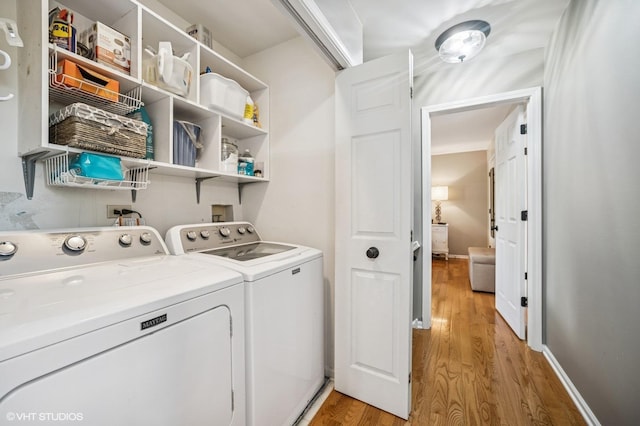 1250 Fernleaf Dr, Crystal Lake, IL 60014 - laundry room featuring washer and dryer and light wood finished floors