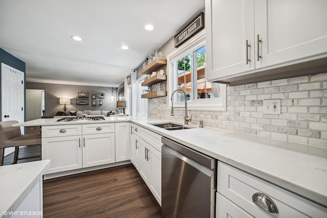 1250 Fernleaf Dr, Crystal Lake, IL 60014 - kitchen featuring dishwasher, a sink, open floor plan, a peninsula, and backsplash