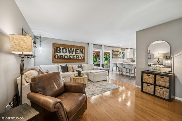 1250 Fernleaf Dr, Crystal Lake, IL 60014 - living area with wood finished floors, recessed lighting, and baseboards