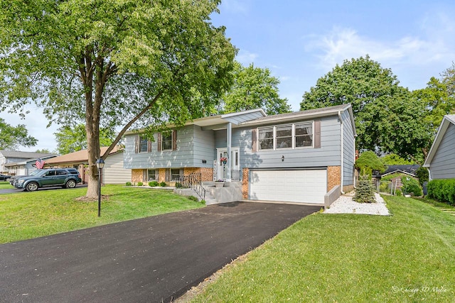 384 Glen Farm Ln, Lake Zurich, IL 60047 - bi-level home with brick siding, driveway, an attached garage, and a front yard