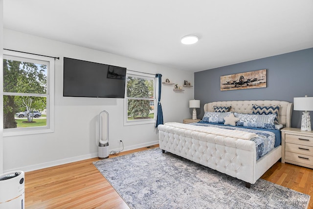 384 Glen Farm Ln, Lake Zurich, IL 60047 - bedroom with light wood-style flooring and baseboards