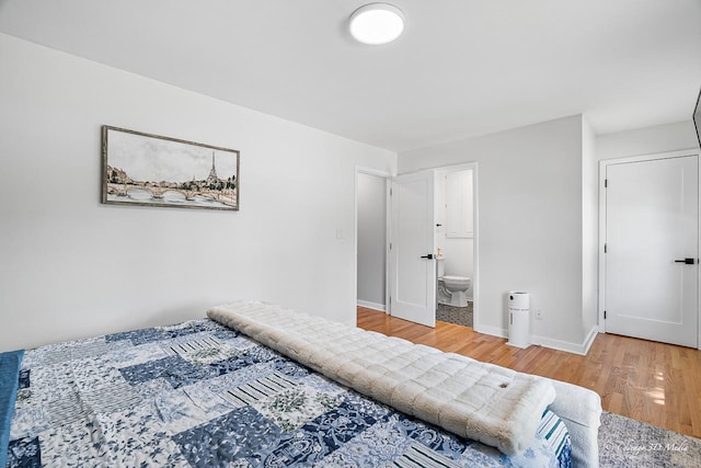 384 Glen Farm Ln, Lake Zurich, IL 60047 - bedroom with light wood-style floors, baseboards, and ensuite bathroom