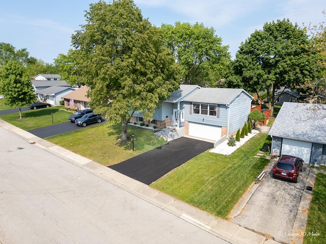 384 Glen Farm Ln, Lake Zurich, IL 60047 - view of front facade with asphalt driveway, a garage, a front lawn, and a residential view