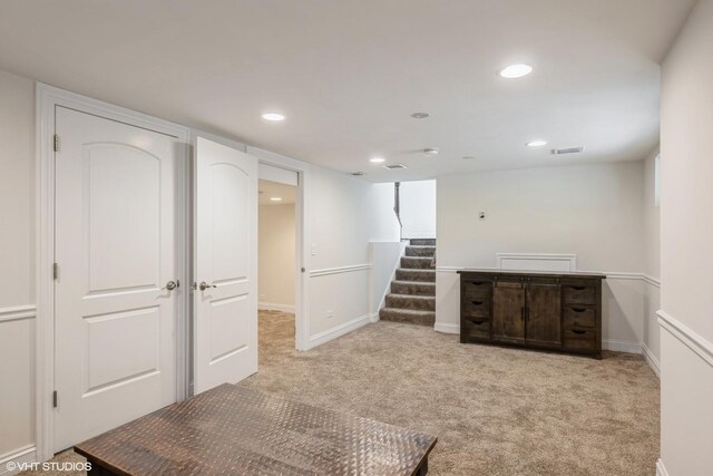 803 Pine St, Deerfield, IL 60015 - finished below grade area featuring light carpet, stairs, recessed lighting, and baseboards