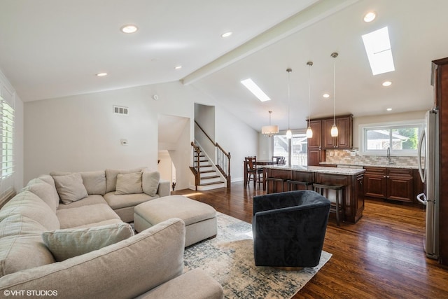 803 Pine St, Deerfield, IL 60015 - living area with a skylight, stairs, dark wood-style flooring, and recessed lighting