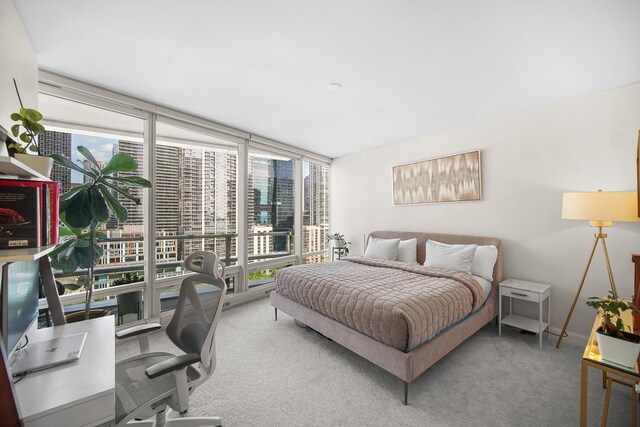 340 E Randolph St Unit 1304, Chicago, IL 60601 - carpeted bedroom featuring floor to ceiling windows and a desk