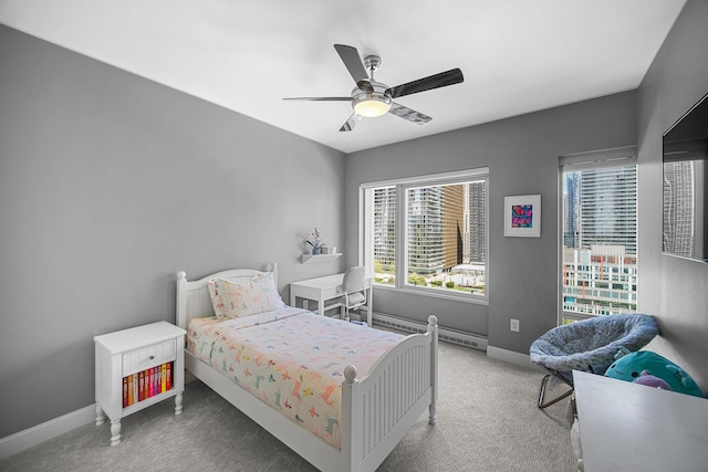 340 E Randolph St Unit 1304, Chicago, IL 60601 - bedroom featuring carpet flooring, baseboards, a baseboard heating unit, and ceiling fan