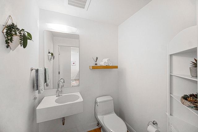 340 E Randolph St Unit 1304, Chicago, IL 60601 - bathroom featuring toilet and a sink