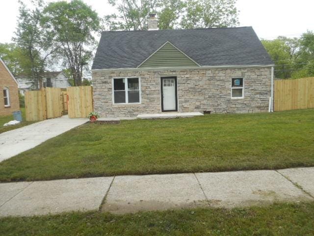 22521 Richton Square Rd, Richton Park, IL 60471 - view of front of home featuring stone siding, a chimney, and a shingled roof
