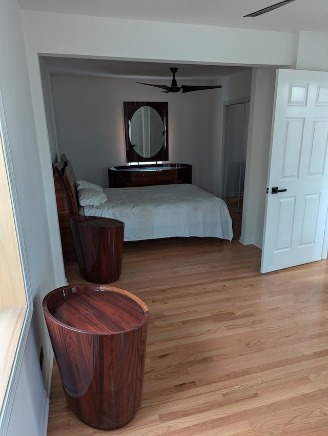 22521 Richton Square Rd, Richton Park, IL 60471 - bedroom with light wood-style floors, a ceiling fan, and baseboards