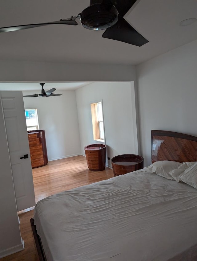 22521 Richton Square Rd, Richton Park, IL 60471 - bedroom with multiple windows, wood finished floors, ceiling fan, and baseboards