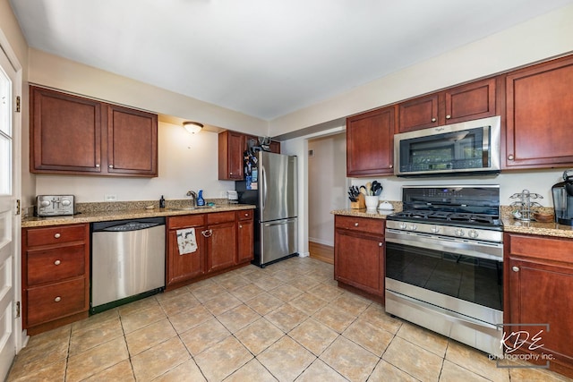 25 Olympus Dr, Naperville, IL 60540 - kitchen with appliances with stainless steel finishes, a sink, light stone countertops, and light tile patterned floors